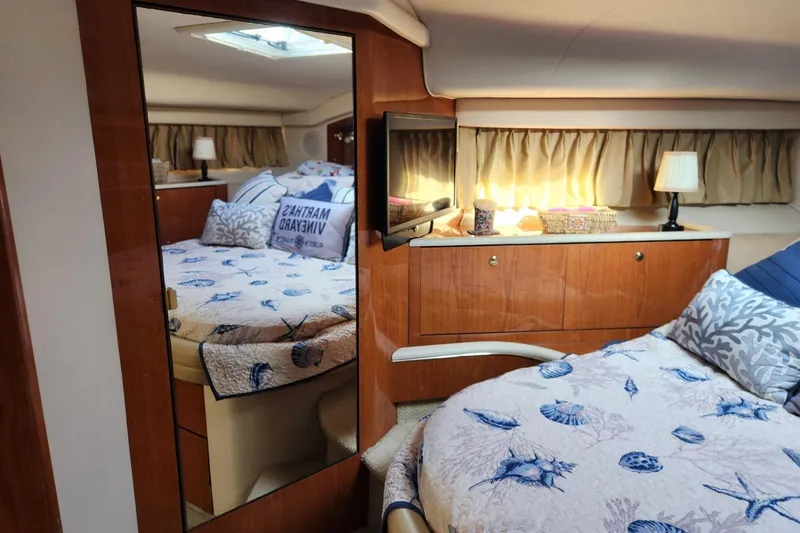 Four Seas Yacht Photos Pics Luxurious cabin interior of 2001 Sea Ray 400 Sedan Bridge yacht with nautical decor.