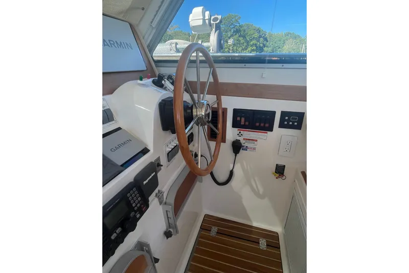 Selah Yacht Photos Pics Interior helm of 2012 Back Cove 37 boat with Garmin navigation system.
