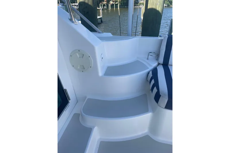 Selah Yacht Photos Pics Staircase and seating area on 2012 Back Cove 37 boat, dockside view.