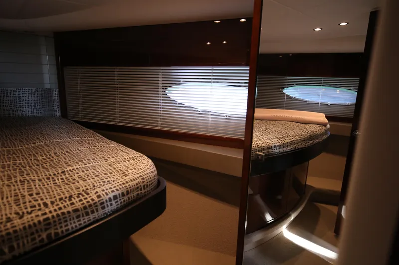  Yacht Photos Pics Interior of 2015 Princess V48 yacht with cozy twin beds and modern design.
