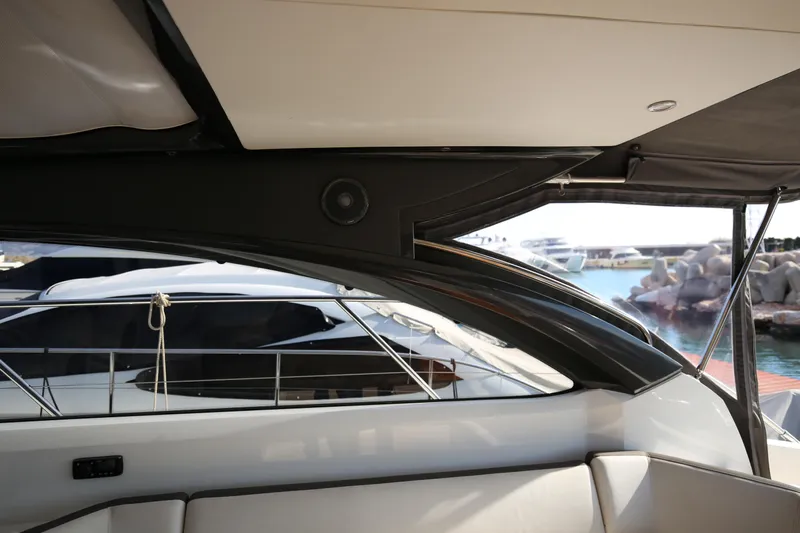  Yacht Photos Pics Interior view of a 2015 Princess V48 yacht, showcasing sleek design and luxury seating.
