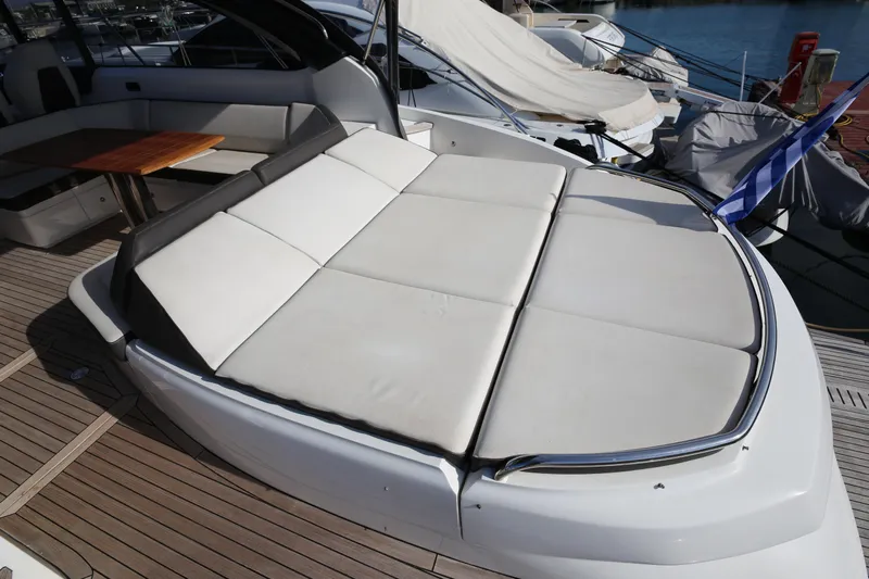  Yacht Photos Pics Luxurious 2015 Princess V48 yacht with spacious sunbed on deck.