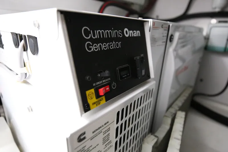  Yacht Photos Pics Cummins Onan generator inside a 2015 Princess V48 yacht engine room.
