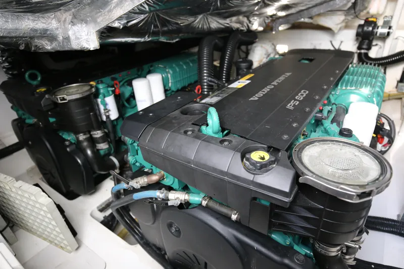  Yacht Photos Pics Engine room of a 2015 Princess V48 yacht, featuring Volvo Penta engines.