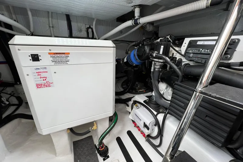  Yacht Photos Pics Engine room of 2022 Sabre 45 Salon Express, showcasing electrical and mechanical components.