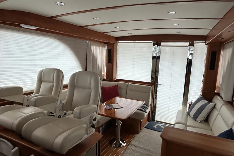  Yacht Photos Pics Luxurious interior of 2022 Sabre 45 Salon Express yacht with plush seating and elegant design.
