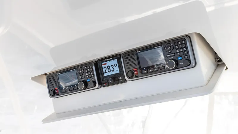 First Bite Yacht Photos Pics Control panel of a 2004 Viking 2005 boat, featuring navigation and communication equipment.