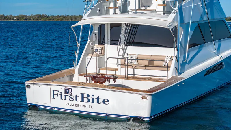 First Bite Yacht Photos Pics Luxury Viking 2005 yacht "First Bite" on blue ocean, Palm Beach, FL.