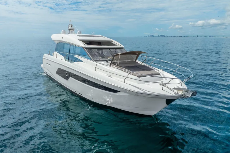  Yacht Photos Pics 2018 Prestige 520S yacht cruising on open sea under clear skies.