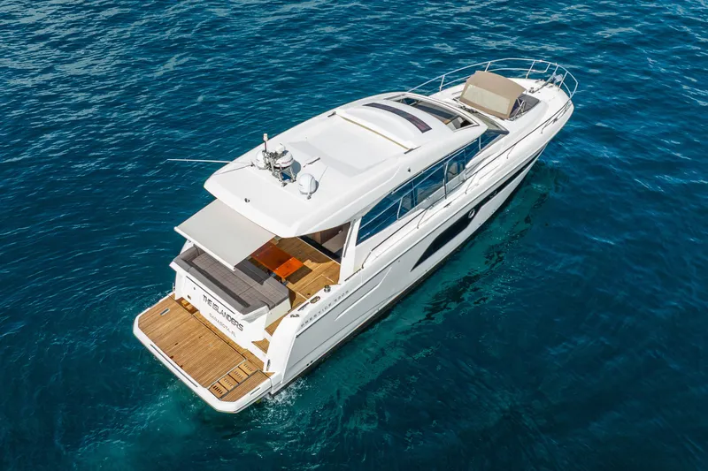  Yacht Photos Pics Luxury 2018 Prestige 520S yacht cruising on clear blue water.