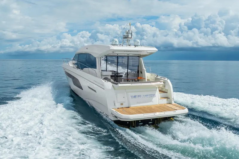  Yacht Photos Pics 2018 Prestige 520S yacht cruising on open sea under cloudy sky.