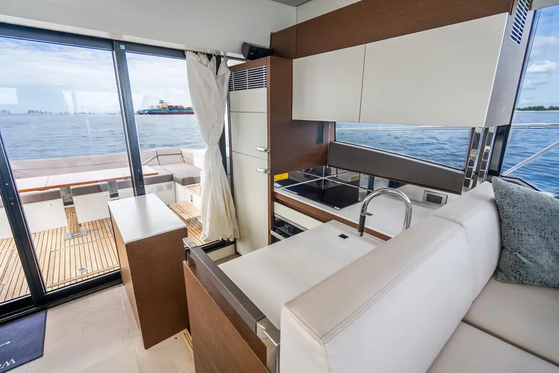  Yacht Photos Pics Luxurious interior of 2018 Prestige 520S yacht with modern kitchen and ocean view.