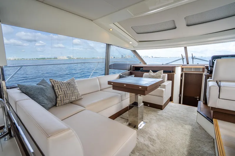  Yacht Photos Pics Luxurious interior of 2018 Prestige 520S yacht with elegant seating and ocean view.