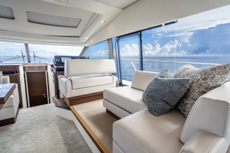  Yacht Photos Pics Luxurious interior of 2018 Prestige 520S yacht with ocean view and plush seating.