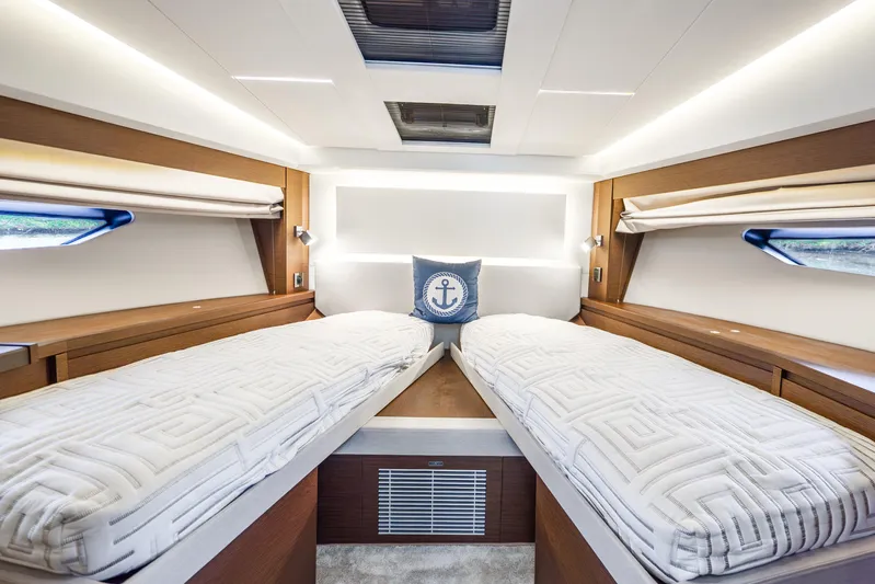  Yacht Photos Pics Luxurious 2018 Prestige 520S yacht cabin with twin beds and nautical decor.