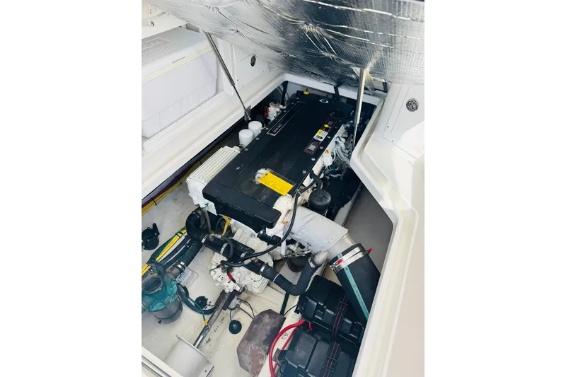 Chance Yacht Photos Pics Engine compartment of a 2007 Back Cove 29 boat, showcasing mechanical components.