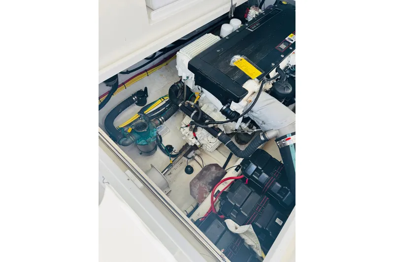 Chance Yacht Photos Pics Engine compartment of a 2007 Back Cove 29 boat, showcasing mechanical components and wiring.