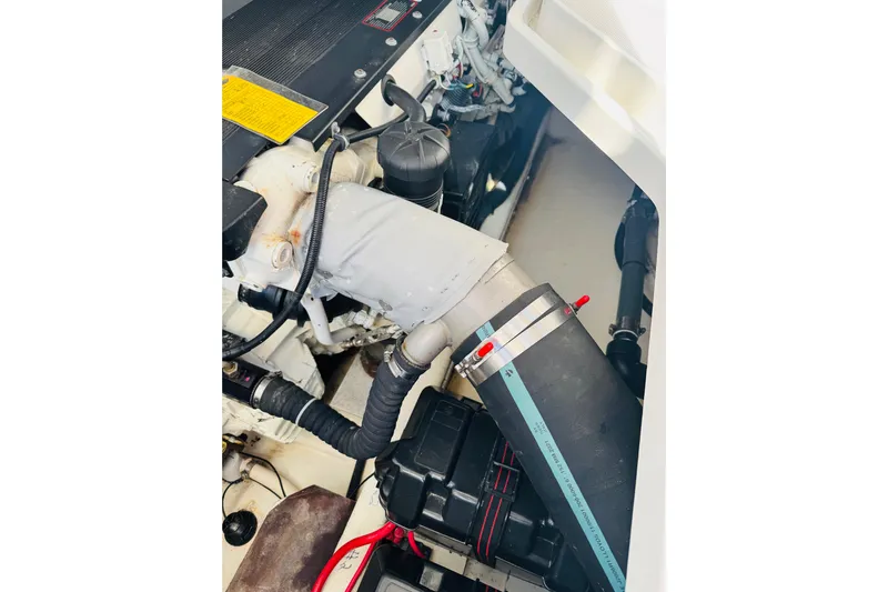 Chance Yacht Photos Pics Engine compartment of a 2007 Back Cove 29 boat, showcasing mechanical components.