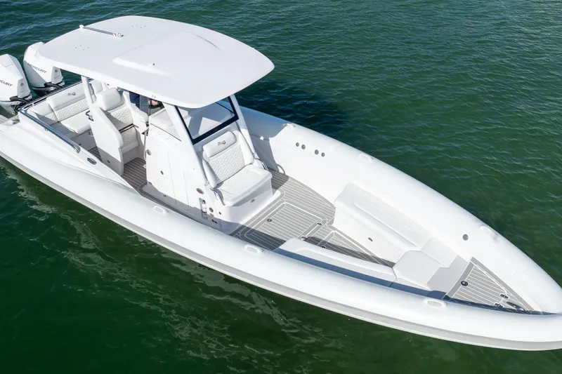  Yacht Photos Pics 2025 Airship 340 boat on water, sleek white design, spacious seating.