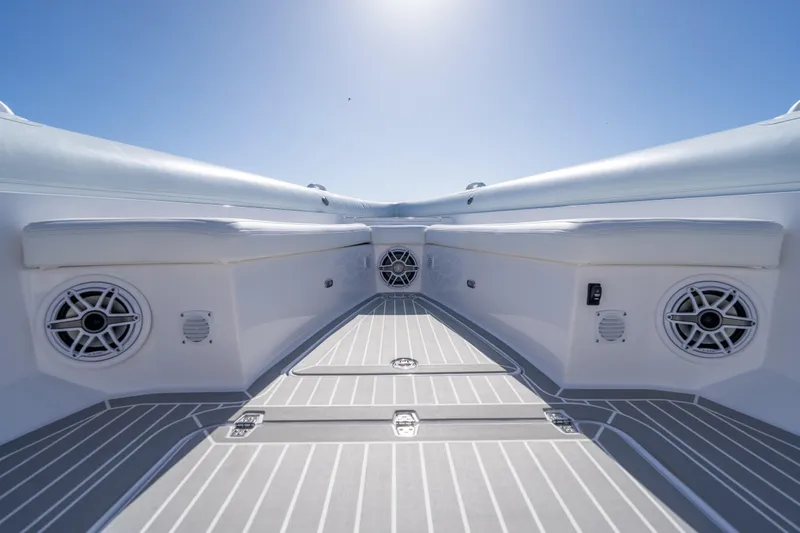  Yacht Photos Pics Interior view of 2025 Airship 340 boat, featuring sleek seating and integrated speakers.