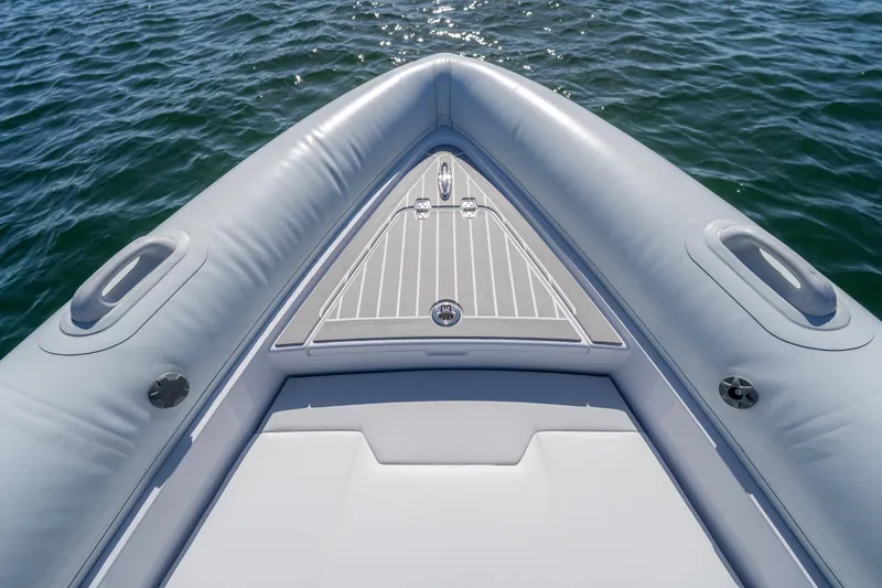  Yacht Photos Pics Bow view of 2025 Airship 340 inflatable boat on water.