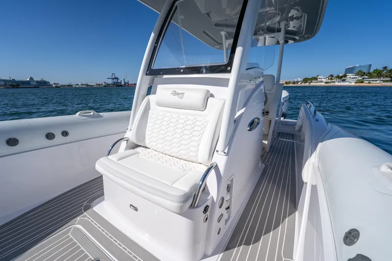  Yacht Photos Pics Luxury Airship 340 boat interior, 2025 model, featuring sleek white seating and modern design.