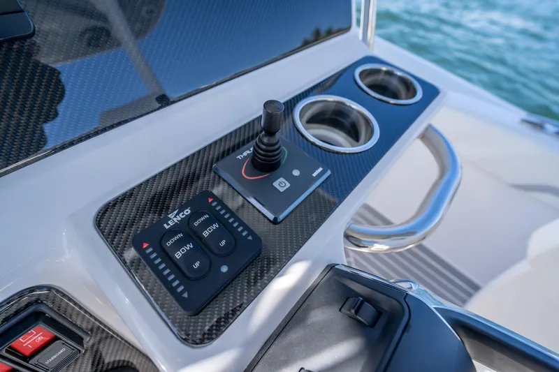  Yacht Photos Pics Control panel of 2025 Airship 340 boat with joystick and cup holders.