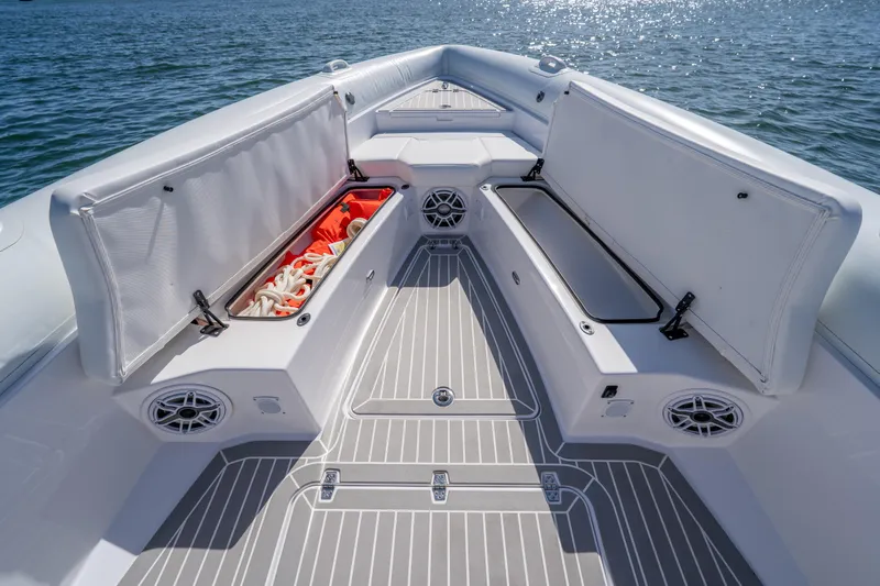  Yacht Photos Pics Airship 340 boat interior, 2025 model, featuring open storage compartments and sleek design on the water.