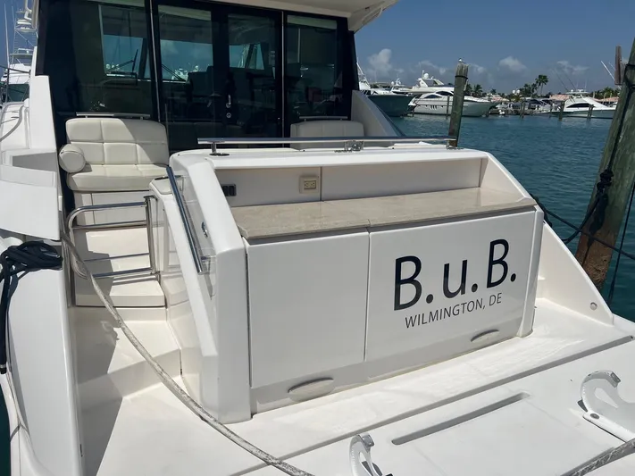 B.u.b. Yacht Photos Pics 2016 Tiara Yachts 44 Coupe docked, rear view with B.U.B. Wilmington, DE on the transom.