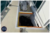 Deck of 1976 BOUVIER/JOUFFRAY BILINGA yacht with open storage compartment.