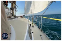 Sailing on a 1976 BOUVIER/JOUFFRAY BILINGA yacht, open sea view.
