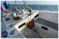 1976 BOUVIER/JOUFFRAY BILINGA yacht cockpit with wooden seating and nautical equipment.