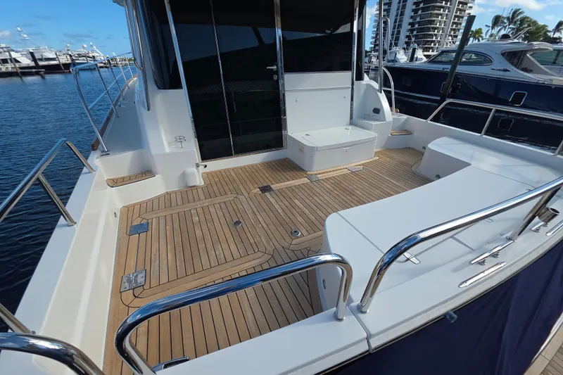 Vertical Yacht Photos Pics 2017 Sabre 48 Salon Express yacht with spacious teak deck and modern design.