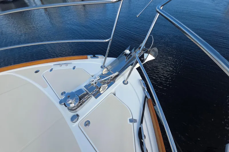 Vertical Yacht Photos Pics Bow of 2017 Sabre 48 Salon Express yacht with anchor and railing.