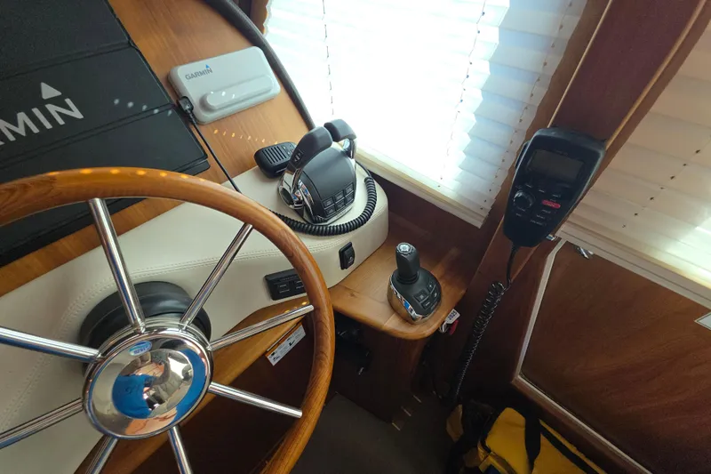 Vertical Yacht Photos Pics Helm of 2017 Sabre 48 Salon Express with Garmin navigation and communication equipment.