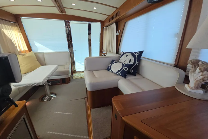 Vertical Yacht Photos Pics Luxurious interior of 2017 Sabre 48 Salon Express yacht with elegant seating and decor.