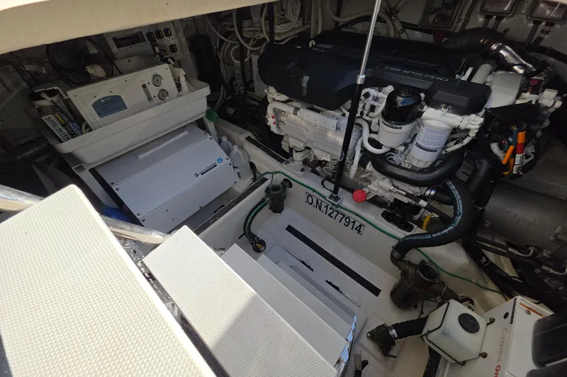 Vertical Yacht Photos Pics Engine room of 2017 Sabre 48 Salon Express, showcasing mechanical components and equipment.