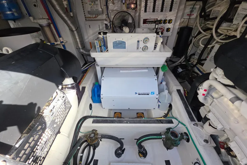 Vertical Yacht Photos Pics Engine room of 2017 Sabre 48 Salon Express with Seakeeper 5 stabilizer system.