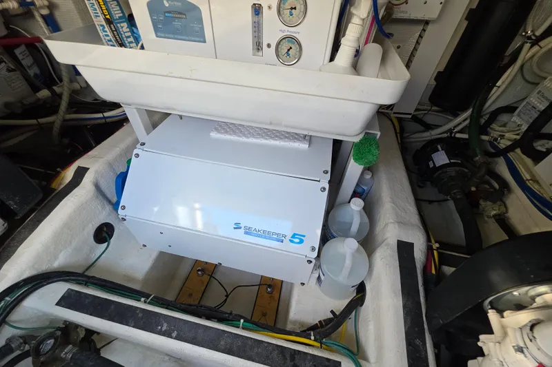 Vertical Yacht Photos Pics Engine room of 2017 Sabre 48 Salon Express with Seakeeper 5 stabilizer system.