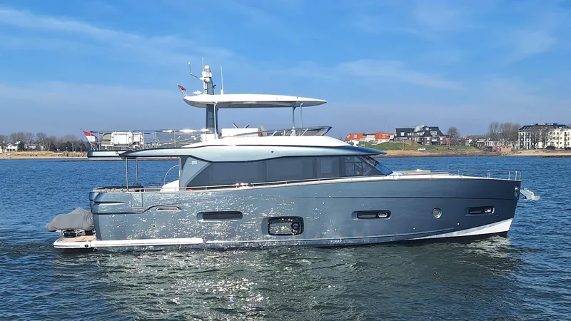 Bella Vita Yacht Photos Pics Azimut Magellano 66 yacht cruising on a sunny day, 2020 model.