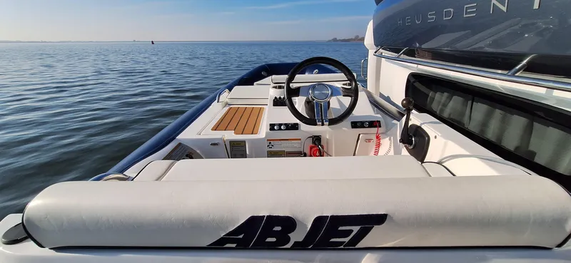 Bella Vita Yacht Photos Pics 2020 Azimut Magellano 66 yacht interior with AB Jet tender on calm water.