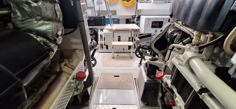 Bella Vita Yacht Photos Pics Engine room of 2020 Azimut Magellano 66 yacht, showcasing machinery and equipment.