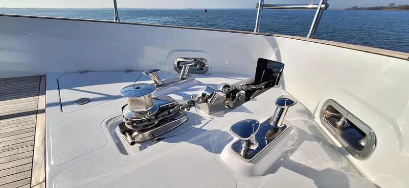 Bella Vita Yacht Photos Pics Deck equipment on 2020 Azimut Magellano 66 yacht, featuring winches and cleats against ocean backdrop.
