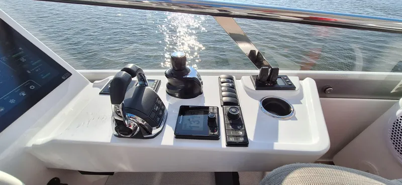 Bella Vita Yacht Photos Pics Control panel of 2020 Azimut Magellano 66 yacht with ocean view.