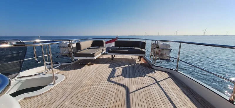 Bella Vita Yacht Photos Pics Azimut Magellano 66 yacht deck, 2020 model, with ocean view and seating area.