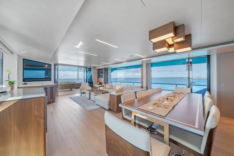 Rio Yacht Photos Pics Luxurious Horizon FD90 yacht interior with modern dining area and ocean view, 2023 model.