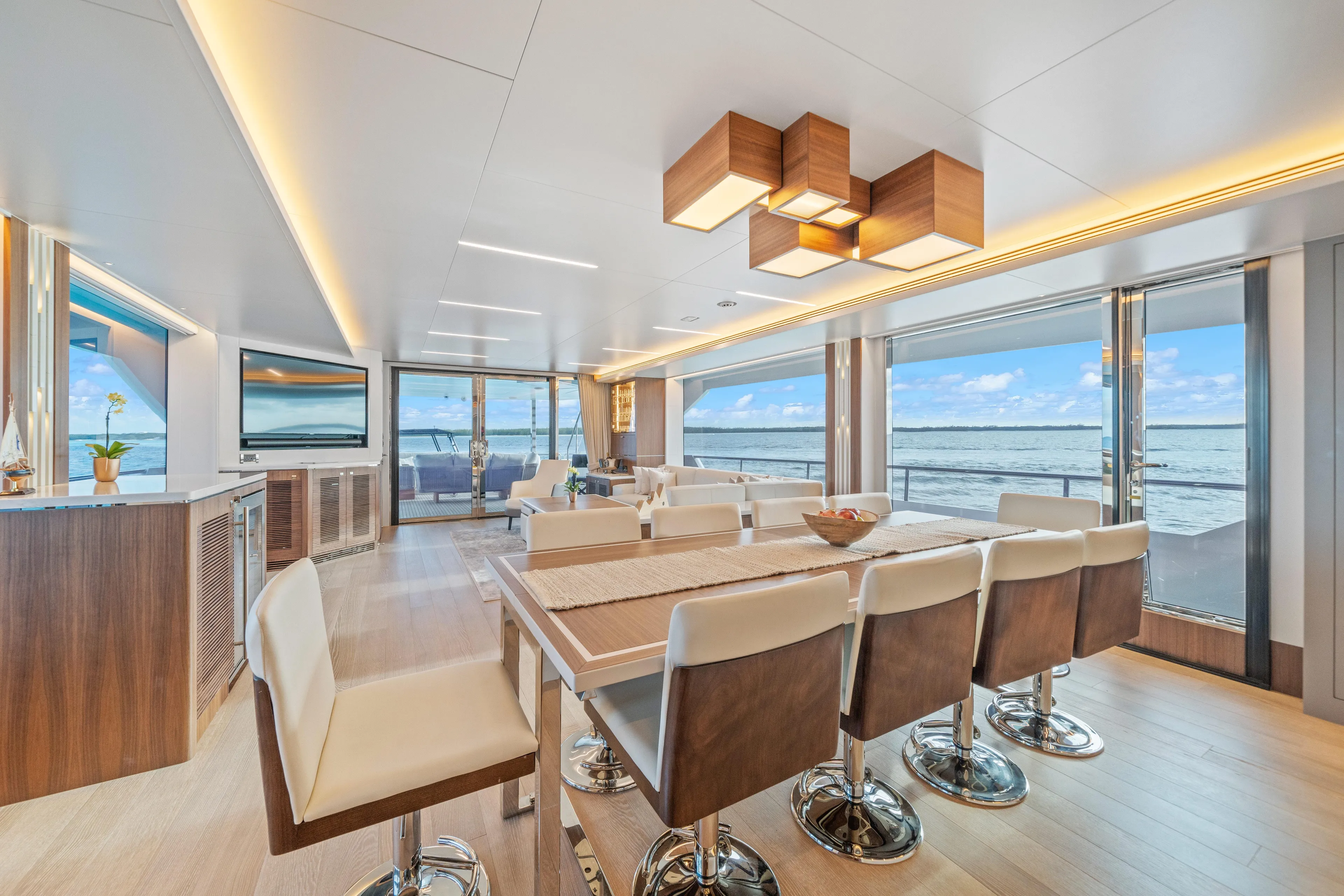 Rio Yacht Photos Pics Luxurious Horizon FD90 yacht interior with modern dining area and ocean view, 2023 model.