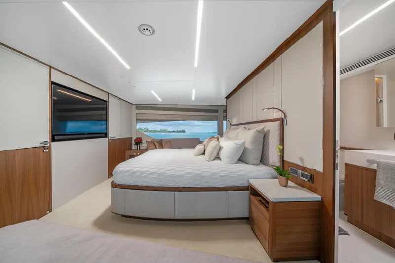 Rio Yacht Photos Pics Luxurious bedroom interior of 2023 Horizon FD90 yacht with modern design and ocean view.