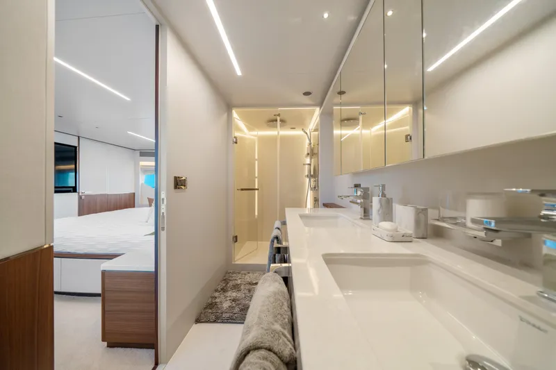 Rio Yacht Photos Pics Luxurious bathroom in 2023 Horizon FD90 yacht with modern fixtures and elegant design.