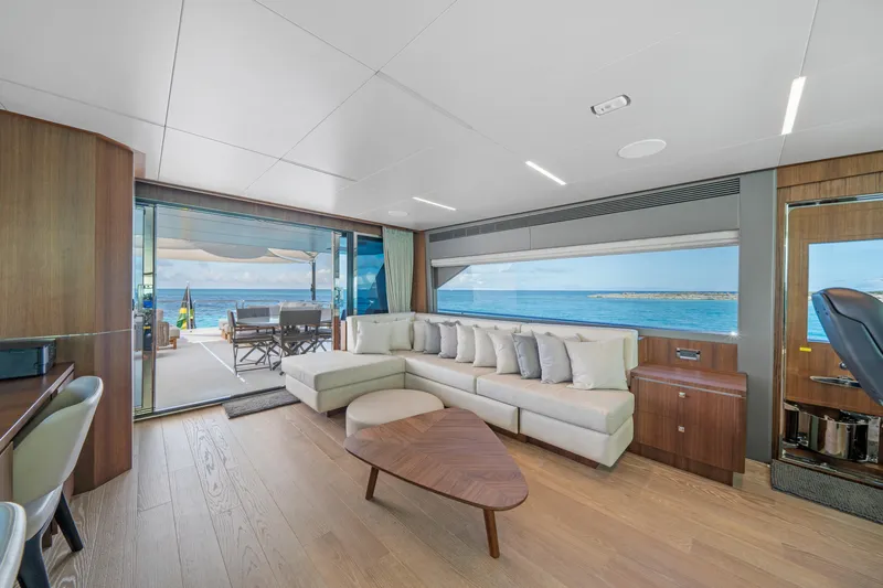 Rio Yacht Photos Pics Luxurious 2023 Horizon FD90 yacht interior with ocean view, modern decor, and spacious seating.